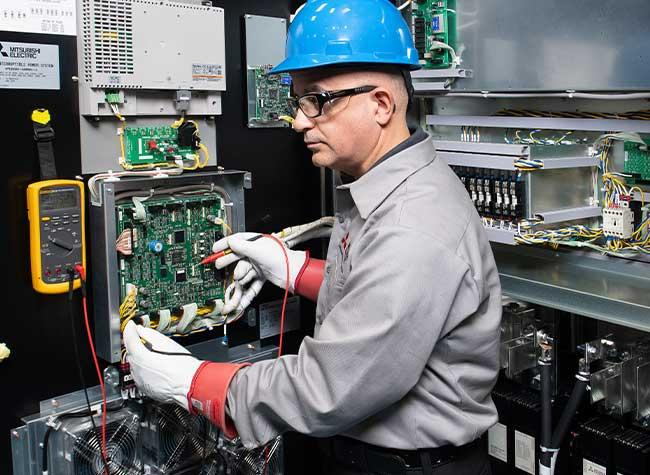 UPS technician servicing critical power equipment